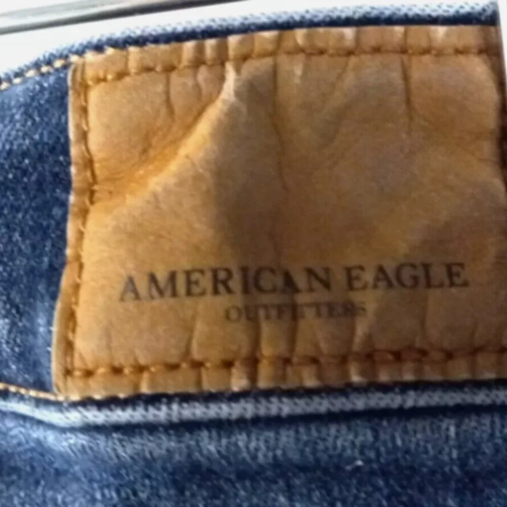 American Eagle Outfitters Distressed Denim Shorts Size 4 Raw Hem Blue Festival